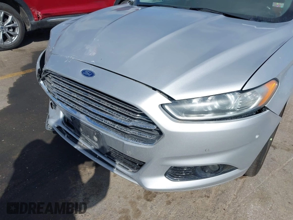 2016 Ford Fusion Titanium with VIN 3FA6P0K92GR214408, listed as a IAAI auction lot 41921923 with 126,063 mi miles and . Bid and sale history available at carsss.com. Image 6.