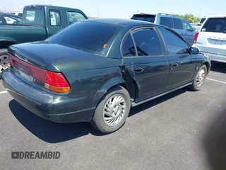 1999 Saturn SL с VIN 1G8ZK5274XZ304652, выставлен на аукционе IAAI как лот 42618620 с пробегом 98 131 миль миль и . История ставок и продаж доступна на DreamBid. Изображение 4.