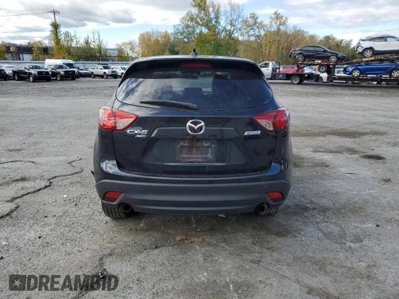 2015 Mazda CX-5 Grand Touring with VIN JM3KE4DY2F0480639, listed as a Copart auction lot 75248594 with 104,652 mi miles and Non Repairable. Bid and sale history available at carsss.com. Image 6.