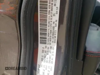 2014 Jeep Cherokee Trailhawk with VIN 1C4PJMBS6EW140981, listed as a Copart auction lot 58260325 with 97,036 mi miles and Salvage title. Bid and sale history available at DreamBid. Image 13.