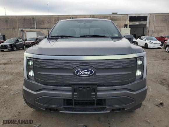 2024 Ford F-150 Lightning LARIAT with VIN 1FT6W5L79RWG19060, listed as a Copart auction lot 43415085 with 2,733 mi miles and Salvage Title. Bid and sale history available at carsss.com. Image 5.