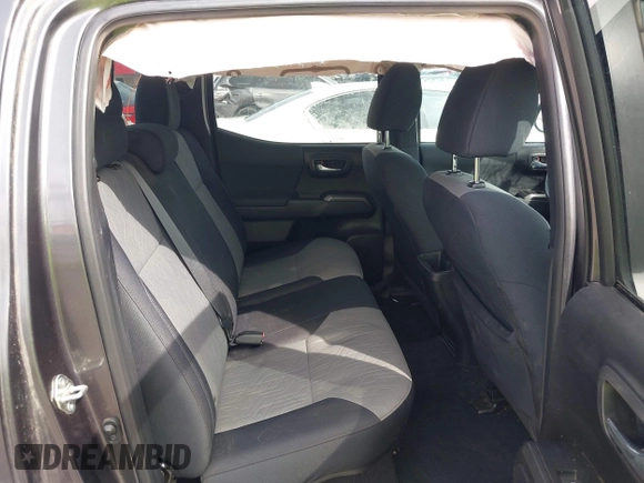 2020 Toyota Tacoma SR5 with VIN 3TMCZ5AN7LM321061, listed as a IAAI auction lot 41985533 with 32,111 mi miles and . Bid and sale history available at DreamBid. Image 8.