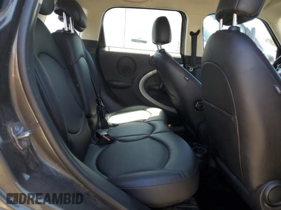 2014 MINI Countryman with VIN WMWZB3C54EWR39731, listed as a Copart auction lot 63635215 with 85,751 mi miles and Salvage title. Bid and sale history available at DreamBid. Image 10.