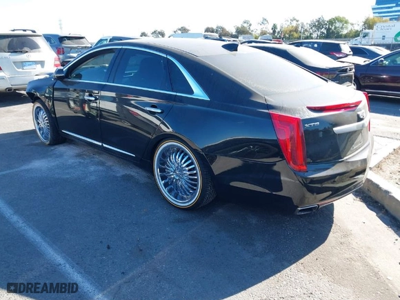 2016 Cadillac XTS Luxury Collection with VIN 2G61M5S3XG9156479, listed as a IAAI auction lot 41331374 with 129,246 mi miles. Bid and sale history available at carsss.com. Image 3.