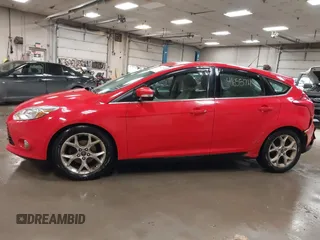 2012 Ford Focus SEL with VIN 1FAHP3M23CL460290, listed as a IAAI auction lot 41655711 with 137,743 mi miles. Bid and sale history available at carsss.com. Image 14.