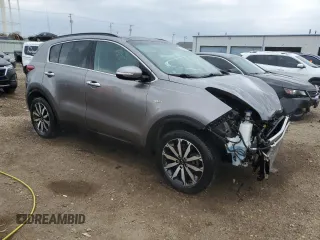 2018 Kia Sportage EX z VIN KNDPNCAC6J7384899, wystawiony jako Copart lot #53459515 z przebiegiem 49 229 mil mil oraz Szkoda całkowita • Salvage title. Historia ofert i sprzedaży dostępna na DreamBid. Obrazek 4.
