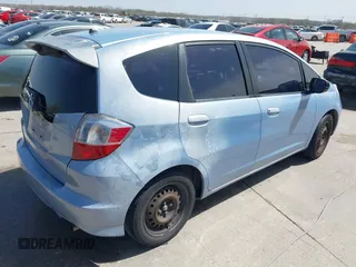 2009 Honda Fit with VIN JHMGE88289S004009, listed as a IAAI auction lot 41803838 with 194,304 mi miles. Bid and sale history available at carsss.com. Image 4.