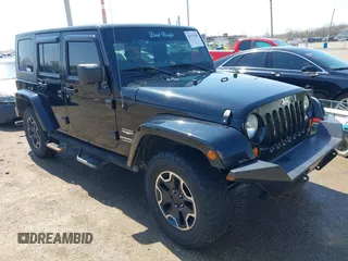 2007 Jeep Wrangler Unlimited Sahara z VIN 1J4GA59117L185067, wystawiony jako IAAI lot #41973548 z przebiegiem 199 295 mil mil oraz . Historia ofert i sprzedaży dostępna na DreamBid. Obrazek 1.