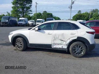 2023 Mazda CX-30 S with VIN 3MVDMBAM8PM545288, listed as a IAAI auction lot 42198433 with 19,609 mi miles and . Bid and sale history available at DreamBid. Image 14.