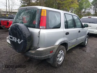 2001 Honda CR-V LX with VIN JHLRD28441C000682, listed as a IAAI auction lot 42019317 with 214,884 mi miles. Bid and sale history available at carsss.com. Image 4.