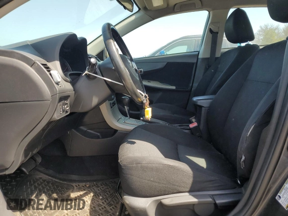 2010 Toyota Corolla with VIN 2T1BU4EE5AC242671, listed as a Copart auction lot 61998285 with 210,290 mi miles and Clean title. Bid and sale history available at DreamBid. Image 7.