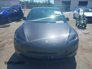 2025 Tesla Model 3 Long Range with VIN 5YJ3E1EA5SF902847, listed as a IAAI auction lot 41776081 with 2,461 mi miles and . Bid and sale history available at carsss.com. Image 12.