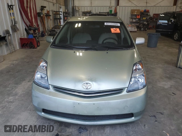 2007 Toyota Prius z VIN JTDKB20U577556730, wystawiony jako Copart lot #61117255 z przebiegiem Nie podano mil oraz Nie do naprawy • Non repairable. Historia ofert i sprzedaży dostępna na DreamBid. Obrazek 5.