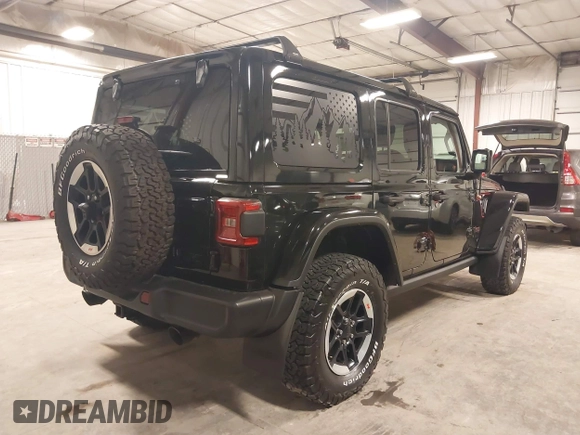 2021 Jeep Wrangler Unlimited Rubicon with VIN 1C4HJXFN2MW719135, listed as a IAAI auction lot 41835698 with 20,447 mi miles and . Bid and sale history available at DreamBid. Image 4.