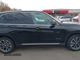 2016 BMW X5 sDrive35i with VIN 5UXKR2C59G0U17661, listed as a IAAI auction lot 40931088 with 90,963 mi miles. Bid and sale history available at carsss.com. Image 13.