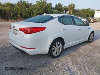 2013 Kia Optima LX with VIN 5XXGM4A77DG116306, listed as a IAAI auction lot 41872854 with 204,101 mi miles and . Bid and sale history available at carsss.com. Image 4.