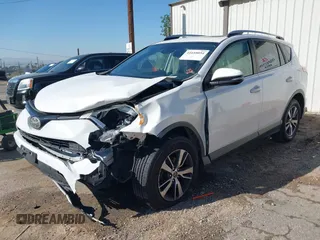 2017 Toyota RAV4 XLE with VIN JTMWFREV9HJ128521, listed as a IAAI auction lot 41658054 with 106,788 mi miles and . Bid and sale history available at DreamBid. Image 2.
