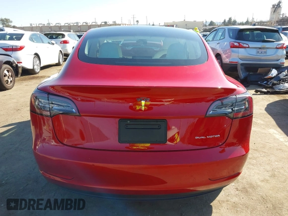2021 Tesla Model 3 Long Range with VIN 5YJ3E1EBXMF990242, listed as a IAAI auction lot 41674222 with 24,554 mi miles and . Bid and sale history available at DreamBid. Image 16.