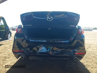 2024 Mazda 3 S Preferred with VIN 3MZBPACM3RM412767, listed as a IAAI auction lot 41518459 with 8,702 mi miles and . Bid and sale history available at carsss.com. Image 16.