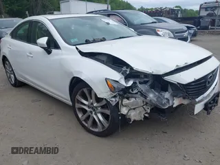 2015 Mazda 6 i Touring with VIN JM1GJ1V55F1193366, listed as a IAAI auction lot 42321511 with 136,772 mi miles and . Bid and sale history available at DreamBid. Image 1.