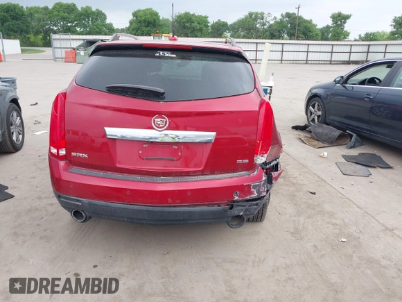 2015 Cadillac SRX Luxury Collection z VIN 3GYFNBE36FS615853, wystawiony jako IAAI lot #41937076 z przebiegiem 109 123 mil mil oraz . Historia ofert i sprzedaży dostępna na DreamBid. Obrazek 17.