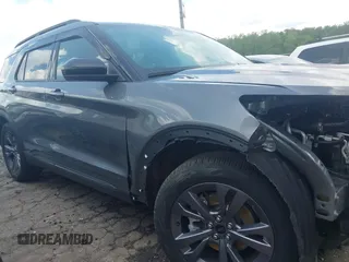2022 Ford Explorer XLT z VIN 1FMSK7DH8NGB12227, wystawiony jako IAAI lot #42171362 z przebiegiem 7 543 mil mil oraz . Historia ofert i sprzedaży dostępna na DreamBid. Obrazek 14.