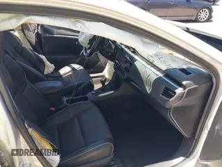 2016 Toyota Corolla L z VIN 5YFBURHE4GP410981, wystawiony jako IAAI lot #42293582 z przebiegiem 77 319 mil mil oraz . Historia ofert i sprzedaży dostępna na DreamBid. Obrazek 5.
