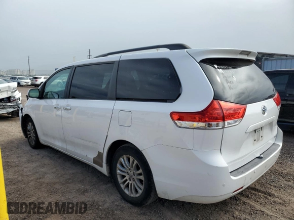 2012 Toyota Sienna XLE AAS with VIN 5TDYK3DC4CS231794, listed as a Copart auction lot 58206235 with 141,935 mi miles and Non repairable. Bid and sale history available at DreamBid. Image 2.