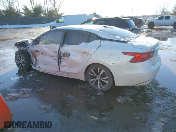 2018 Nissan Maxima S with VIN 1N4AA6APXJC395939, listed as a IAAI auction lot 41635836 with 108,587 mi miles and . Bid and sale history available at DreamBid. Image 14.