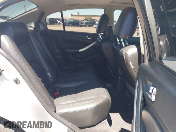 2005 Infiniti G35 z VIN JNKCV51E25M217571, wystawiony jako IAAI lot #42243077 z przebiegiem 135 164 mil mil oraz . Historia ofert i sprzedaży dostępna na DreamBid. Obrazek 8.
