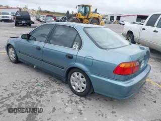 2000 Honda Civic LX with VIN 2HGEJ6571YH591699, listed as a IAAI auction lot 41799962 with 196,288 mi miles. Bid and sale history available at carsss.com. Image 3.