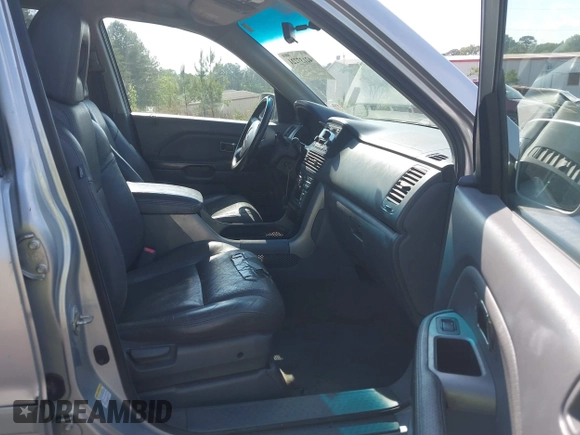 2004 Honda Pilot EX with VIN 2HKYF18504H556213, listed as a IAAI auction lot 42137221 with 225,781 mi miles and . Bid and sale history available at DreamBid. Image 5.