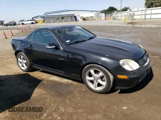 2002 Mercedes-Benz SLK-Class 3.2L with VIN WDBKK65F12F254172, listed as a Copart auction lot 74336334 with 148,405 mi miles and Salvage Title. Bid and sale history available at carsss.com. Image 4.