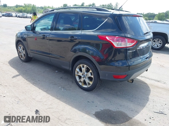 2013 Ford Escape SEL with VIN 1FMCU9HX5DUC90186, listed as a IAAI auction lot 42650691 with 151,009 mi miles and . Bid and sale history available at DreamBid. Image 3.