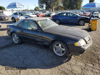 1997 Mercedes-Benz SL-Class with VIN WDBFA63F5VF144026, listed as a Copart auction lot 80580024 with 138,776 mi miles and Clean Title. Bid and sale history available at carsss.com. Image 4.