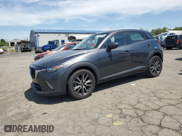 2017 Mazda CX-3 Touring z VIN JM1DKFC76H0149368, wystawiony jako Copart lot #55747305 z przebiegiem 47 946 mil mil oraz Szkoda całkowita • Salvage title. Historia ofert i sprzedaży dostępna na DreamBid. Obrazek 1.