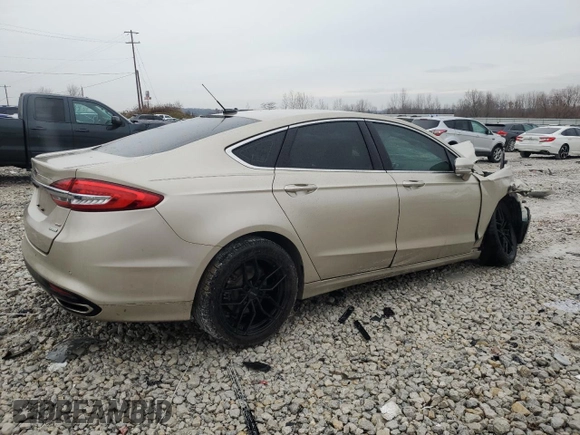2017 Ford Fusion SE z VIN 3FA6P0H97HR166462, wystawiony jako Copart lot #86265204 z przebiegiem 65 707 mil mil oraz Szkoda całkowita • Salvage title. Historia ofert i sprzedaży dostępna na DreamBid. Obrazek 3.