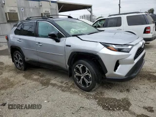 2024 Toyota RAV4 XSE with VIN JTMEB3FV2RD208004, listed as a Copart auction lot 61501635 with 8,392 mi miles and Salvage title. Bid and sale history available at DreamBid. Image 4.
