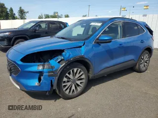 2020 Ford Escape Titanium z VIN 1FMCU9J90LUB15564, wystawiony jako Copart lot #59673625 z przebiegiem 84 474 mil mil oraz Czysty tytuł • Clean title. Historia ofert i sprzedaży dostępna na DreamBid. Obrazek 1.