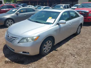 2009 Toyota Camry LE z VIN 4T1BK46K49U592233, wystawiony jako IAAI lot #42205847 z przebiegiem 141 226 mil mil oraz . Historia ofert i sprzedaży dostępna na DreamBid. Obrazek 2.