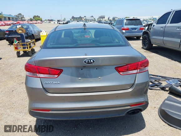 2018 Kia Optima LX with VIN 5XXGT4L34JG266575, listed as a IAAI auction lot 42458844 with 73,394 mi miles and . Bid and sale history available at DreamBid. Image 16.