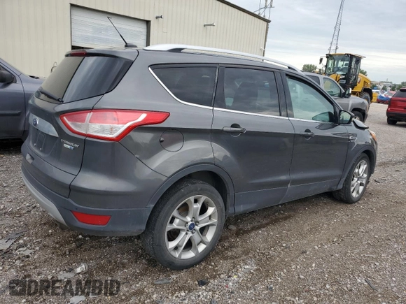 2015 Ford Escape Titanium with VIN 1FMCU9J96FUB32972, listed as a Copart auction lot 62886145 with 215,769 mi miles and Salvage title. Bid and sale history available at DreamBid. Image 3.