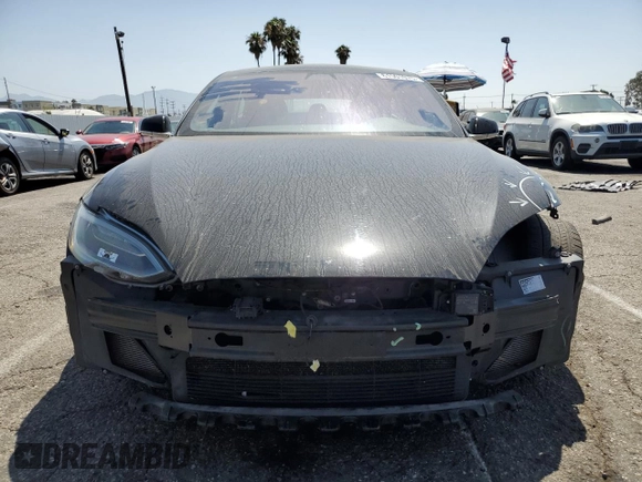2018 Tesla Model S 75D с VIN 5YJSA1E24JF248762, выставлен на аукционе Copart как лот 61501075 с пробегом 63 802 миль миль и Списание • Salvage title. История ставок и продаж доступна на DreamBid. Изображение 5.