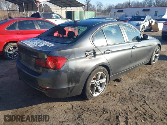 2015 BMW 3 Series 328i xDrive with VIN WBA3B5G55FNS19437, listed as a IAAI auction lot 41765832 with 137,993 mi miles. Bid and sale history available at carsss.com. Image 4.