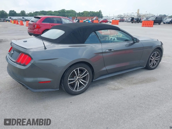 2016 Ford Mustang EcoBoost Premium with VIN 1FATP8UH5G5268939, listed as a IAAI auction lot 39955368 with 106,676 mi miles and . Bid and sale history available at carsss.com. Image 4.