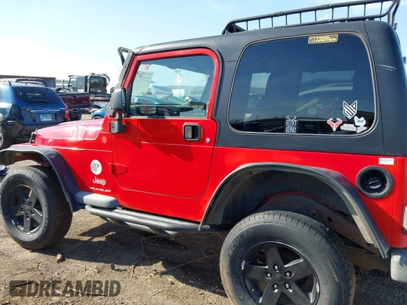 2004 Jeep Wrangler Sport Right Hand Drive with VIN 1J4F449S74P796957, listed as a IAAI auction lot 41987562 with 106,730 mi miles and . Bid and sale history available at carsss.com. Image 14.
