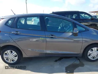 2020 Honda Fit LX with VIN 3HGGK5H46LM725764, listed as a IAAI auction lot 42499144 with 79,758 mi miles and . Bid and sale history available at DreamBid. Image 14.