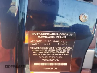 2006 Aston Martin DB9 z VIN SCFAB02A96GB04608, wystawiony jako Copart lot #76550654 z przebiegiem Nie podano mil oraz Nie do naprawy. Historia ofert i sprzedaży dostępna na DreamBid. Obrazek 12.