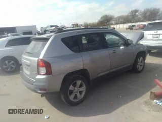 2016 Jeep Compass Latitude with VIN 1C4NJDEBXGD594149, listed as a IAAI auction lot 41523706 with 113,200 mi miles. Bid and sale history available at carsss.com. Image 4.