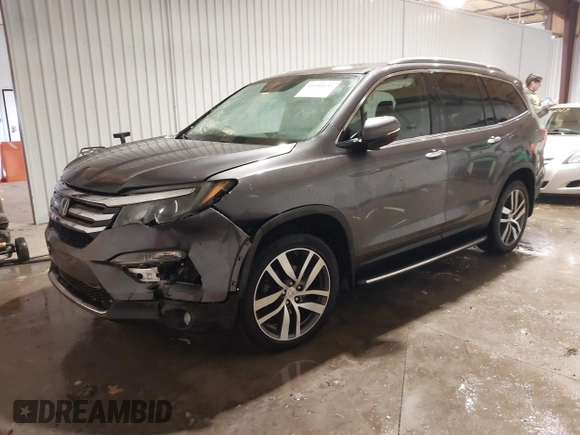 2017 Honda Pilot Touring with VIN 5FNYF6H91HB084737, listed as a IAAI auction lot 41608145 with 86,696 mi miles. Bid and sale history available at carsss.com. Image 2.